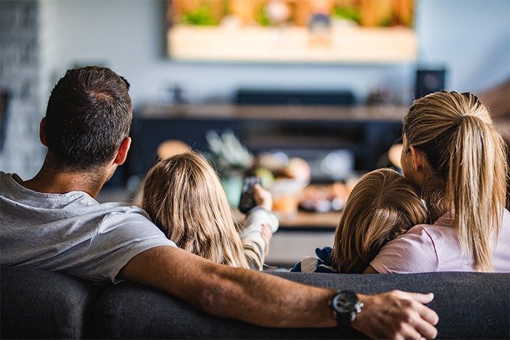 Family enjoying their favorite shows data-free with Viasat Stream